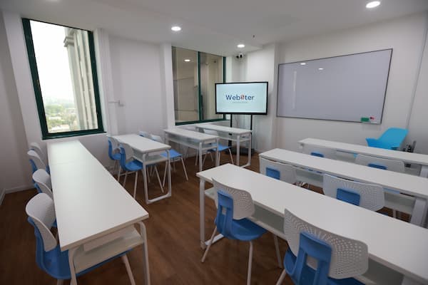 Teacher guiding students at Webster Language Centre, Kuala Lumpur